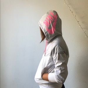Pink-while-grey Nike windbreaker